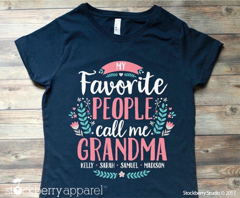 May include: Navy blue t-shirt with the text "My Favorite People Call Me Grandma" in pink and white. The names Kelly, Sarah, Samuel, and Madison are listed below the text.