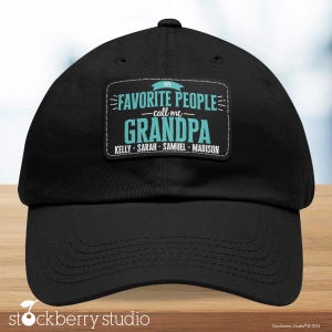 May include: Black baseball cap with a blue and white patch that reads "My Favorite People - call me Grandpa Kelly - Sarah - Samuel - Madison".