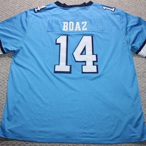 May include: A light blue football jersey with the number "14" and the name "BOAZ" on the back.