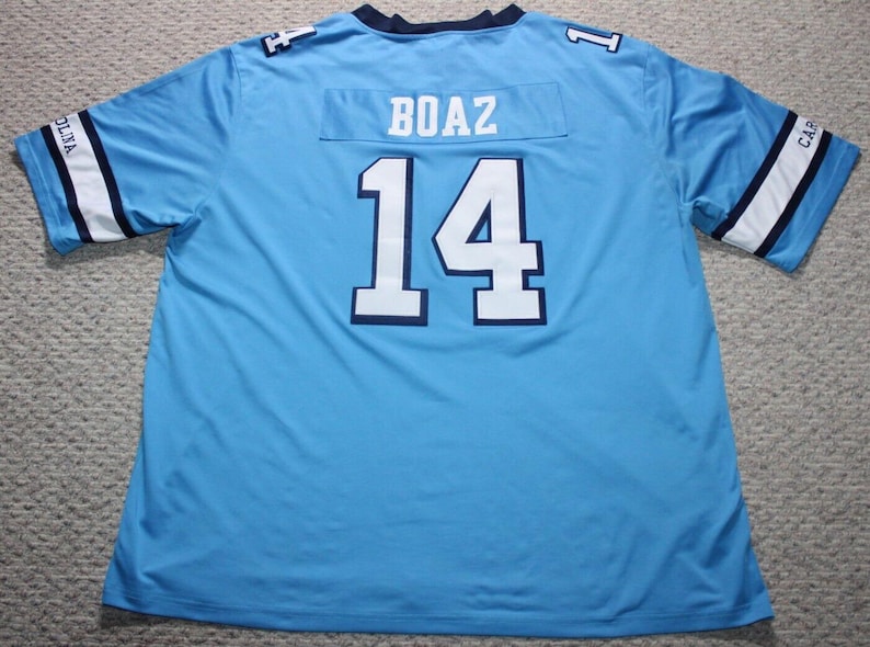 May include: A light blue football jersey with the number "14" and the name "BOAZ" on the back.