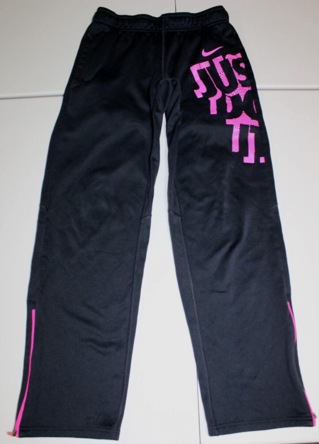 black and pink nike sweatpants