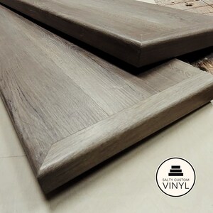 Custom made open right stair tread cover made from luxury vinyl flooring planks.