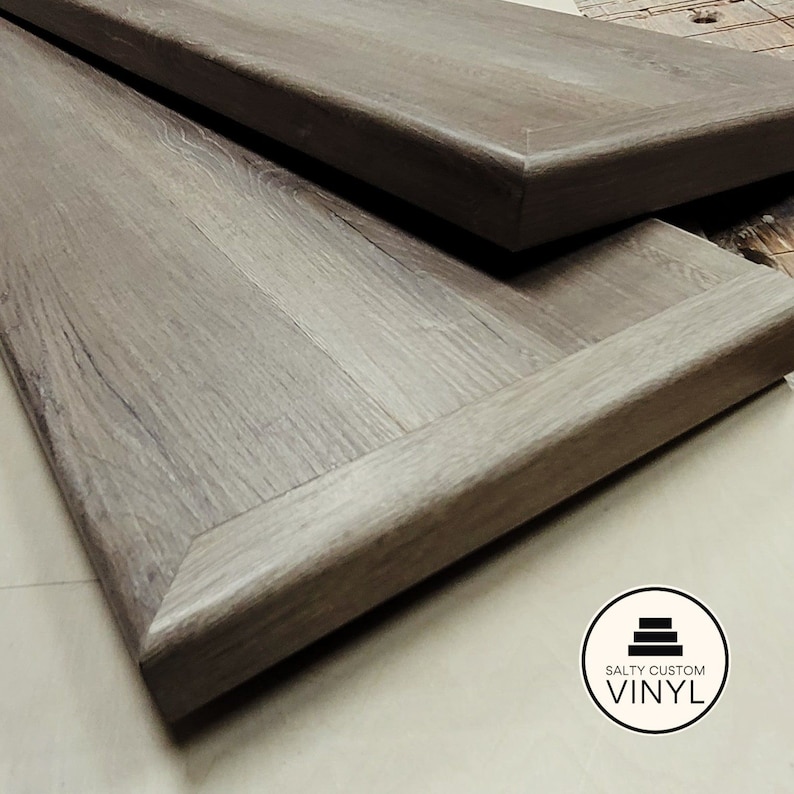 Custom made open right stair tread cover made from luxury vinyl flooring planks.