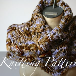 May include: A knitted cowl with a brown, purple, and green color scheme. The cowl is decorated with two brown horn-shaped clasps. The cowl is displayed on a mannequin. "Knitting Pattern" is written in cursive at the bottom of the image.