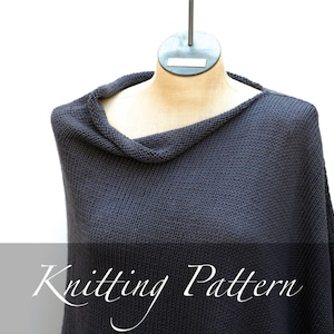 May include: Knitting pattern for a dark gray cowl neck sweater. The sweater is draped over a mannequin.