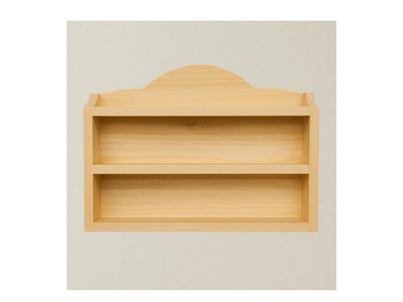 May include: A natural wood wall shelf with two shelves and a decorative arched top. The shelf is made of light-colored wood and is designed for displaying items. The shelves are approximately 12 inches wide.