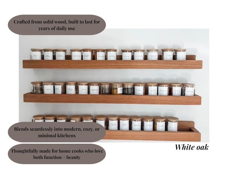 May include: Three wooden shelves with glass spice jars and wooden lids. The shelves are made of white oak and are mounted on a white wall. The jars have white labels. The text in the image says "Crafted from solid wood, built to last for years of daily use."
