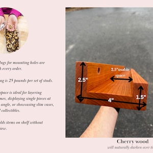 May include: A wooden shelf bracket in cherry wood with a 2.5 inch usable space, 4 inch length, and 1.5 inch depth. The bracket is shown with a hand holding it. The text "Cherry wood will naturally darken over time." is below the bracket.