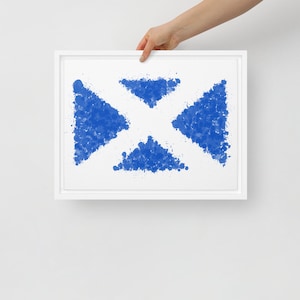 K&ouml;nnte beinhalten: Ein wei&szlig; gerahmter Druck eines blauen abstrakten Designs. Das Design besteht aus kleinen blauen Kreisen, die die Form eines Kreuzes bilden.