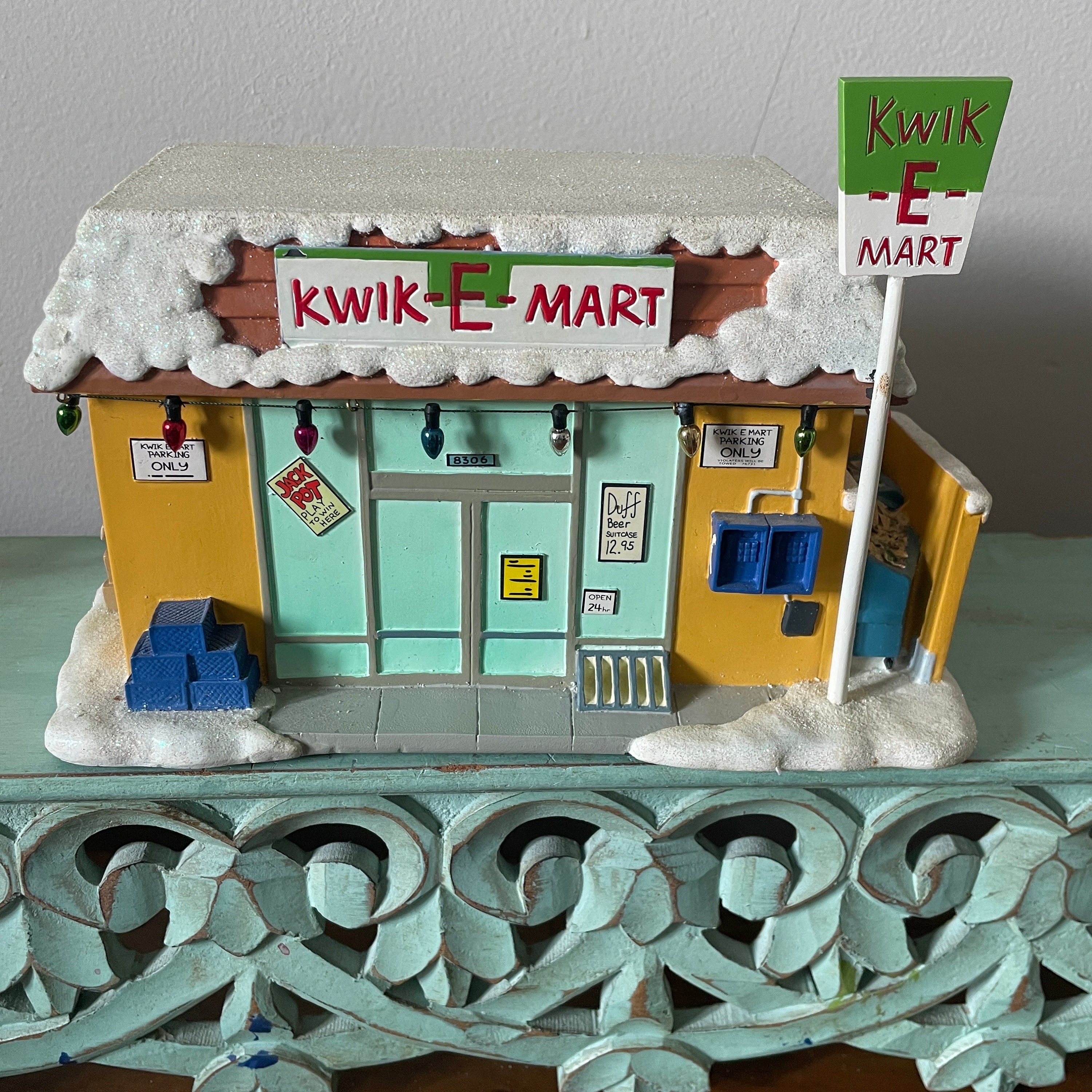 置物 Its value is whatever you make of it. Light-up Kwik-e-mart, the Simpsons Christmas Village Collection