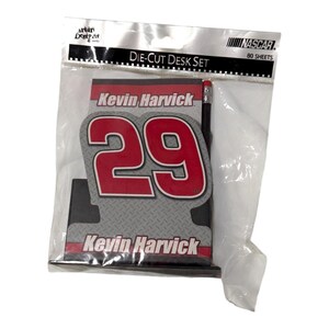 May include: A die-cut desk set with the number 29 in red and white, and the name "Kevin Harvick". The set includes a pencil and is packaged in a clear plastic bag. The set is branded with the NASCAR logo and contains 80 sheets.