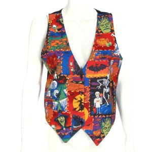 May include: A Halloween-themed vest with a patchwork design. The vest features various spooky images, including pumpkins, witches, bats, skeletons, and Frankenstein's monster. The vest has a V-neck and a button-up front. The color palette includes red, orange, purple, and black.