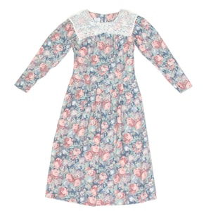 May include: A long-sleeved floral dress with a white lace collar. The dress has a blue background with pink and white flowers.