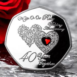 May include: Silver coin with a red heart design and the text "For You On Our Ruby Wedding Anniversary 40 Years Together".