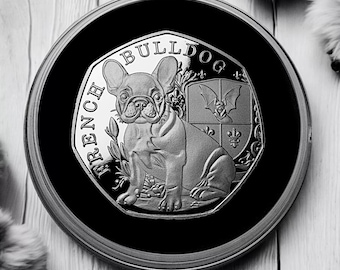 カプセルに入った真新しいフレンチブルドッグの記念銀貨。フレンチ