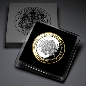 Pièce commémorative maçonnique « Double métal » en argent et or 24 carats. Coffret de présentation. Francs-maçons, Maçons, Loge, Oeil qui voit