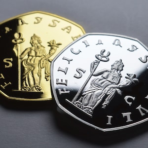 Par de conmemorativos del emperador romano Decio en plata y oro de 24 quilates con Felicitas. Sestercio/Moneda IMP SC