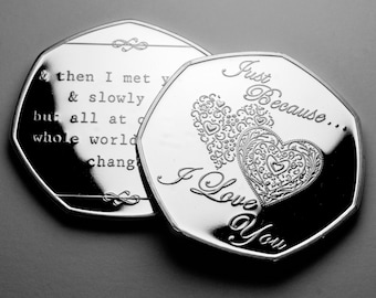 May include: Two silver-toned tokens with a heart design and the text "Just Because... I Love You" on one side and a message about love on the other side.