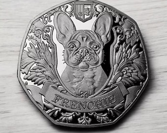 カプセルに入った真新しいフレンチブルドッグの記念銀貨。フレンチ