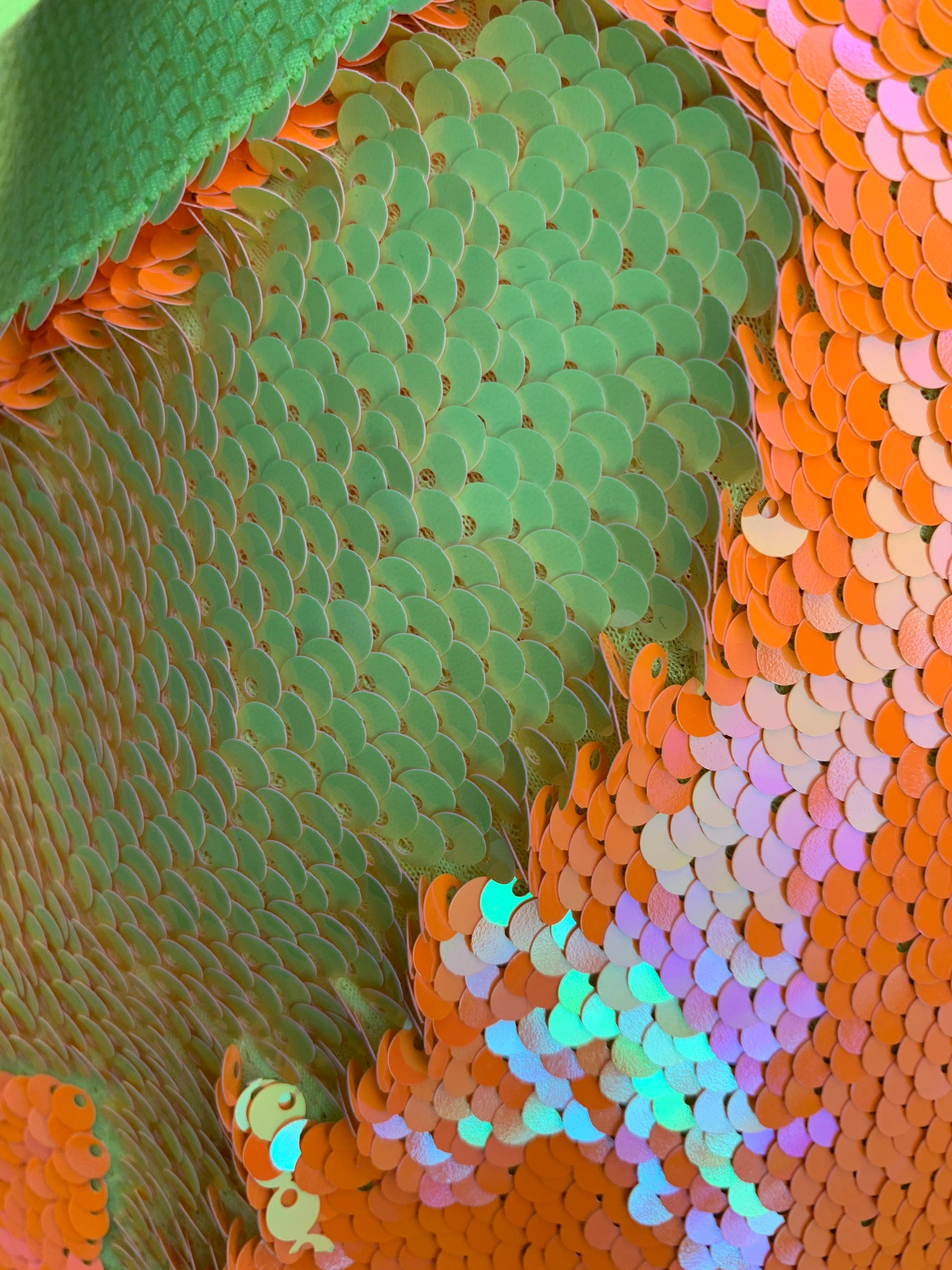 new neon green and neon orange reversible sequin on one way stretch fabric 54"inch wide sold by the yard