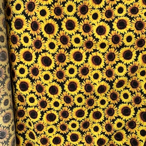 100% cotton black and yellow sunflowers all over print non stretch  fabric sold by the yard