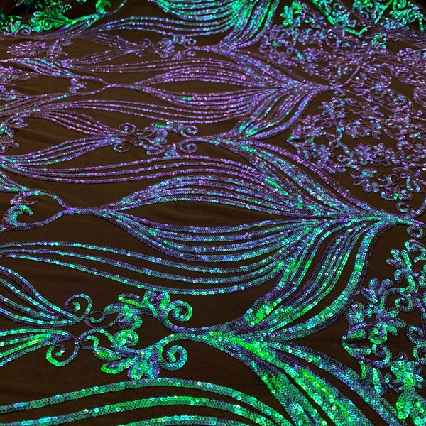 iridescent peacock green and blue color sequin on black color 4 way stretch mesh 54 inch wide fabric for gowns and much more