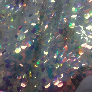 New 20 millimeters iridescent white paillette sequin on  pink mesh fabric 54" inch sold by the yard