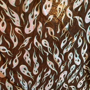 new light blue flames print  on  black 4 way stretch mesh fabric sold by the yard