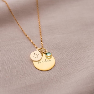 gold plated sterling silver birthday disc necklace personalised with a contemporary script name and age