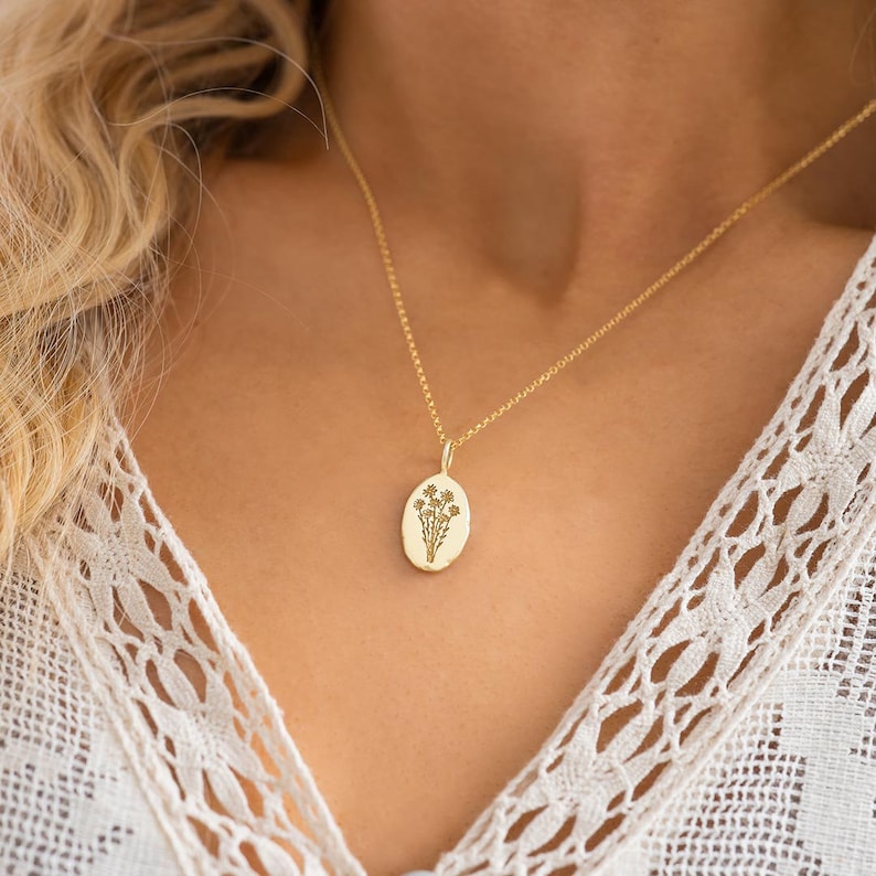 Model wearing a Gold Plated Sterling Silver Oval Birth Flower Personalised Necklace