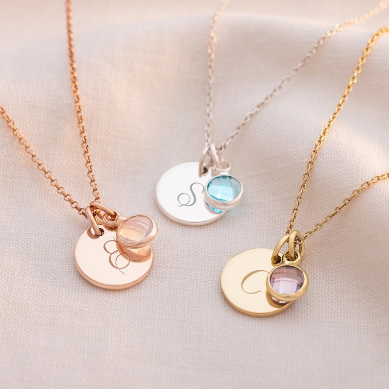 Three Disc Necklaces engraved with Script Style Initial with individual Birthstone charms, one rose gold, one silver, one gold