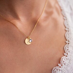 Script Style Initial on Gold Disc Necklace with Birthstone charm Model Shot