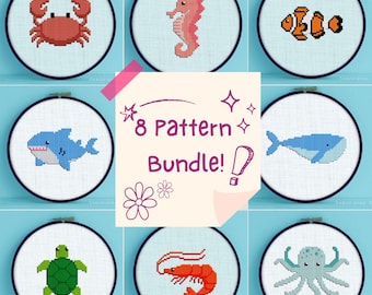 May include: A set of 8 cross-stitch patterns featuring cute sea creatures. The patterns include a crab, a seahorse, a clownfish, a shark, a whale, a turtle, a shrimp, and an octopus. The patterns are perfect for beginners and experienced stitchers alike.