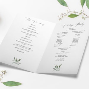 May include: A wedding ceremony program with a green leafy design. The program lists the order of events for the ceremony, including the officiant, parents of the bride and groom, maid of honor, bridesmaids, groomsmen, and ushers.