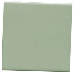 May include: A solid, light green square tile.