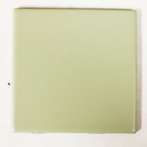 May include: A light green square ceramic tile.
