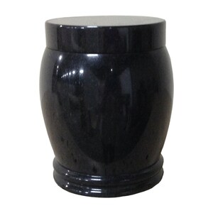 May include: A black granite urn with a smooth, polished finish. The urn has a rounded body and a lid with a slightly raised edge.