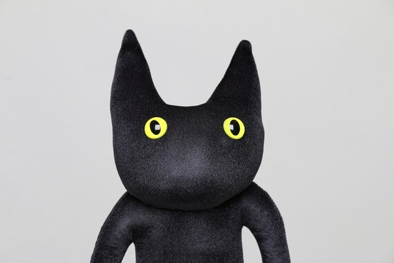 black cat stuffed animal toy