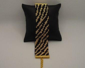 Gold and black beaded bracelet, wide bracelet, with adjustable lenght, zebra style pattern