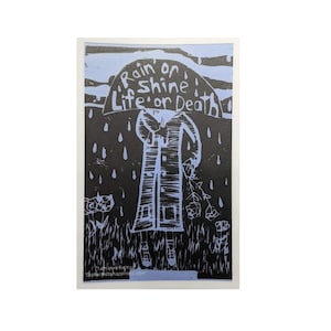 May include: A black and light blue art print featuring a person in a coat under an umbrella with the words "Rain or Shine, Life or Death." The print includes floral and rain drop details, with text at the bottom: "I am here for you / distractedbyhappiness.com."