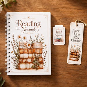 May include: A reading journal, bookmark, and small card with book and floral illustrations. The journal cover reads "Reading Journal". The bookmark says "Just One More Chapter". The card says "Read & Bloom". All items have a vintage aesthetic.