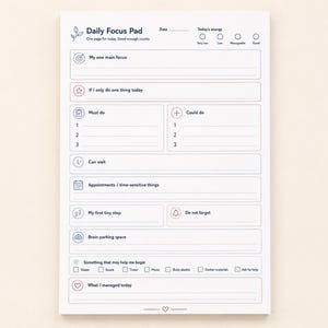 May include: A white daily focus pad with dark blue and red text and icons. Sections include My one main focus, Must do, Could do, Can wait, Appointments, My first tiny step, Do not forget, Brain parking space, and What I managed today.