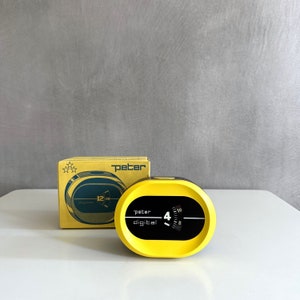 Yellow alarm clock "Peter Germany", Space Age, NOS goods, mechanical clock, desk clock, 70s alarm clock OVP
