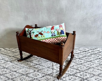 Antique doll's cradle, wooden doll's bed, rocking cradle