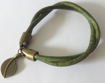 Celtic style leather bracelet. Moss green leather and leaf charm. Druid inspired. Custom-sized.