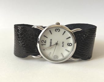 Women's wristwatch with custom-size black lizard band. Designed and handmade in the USA