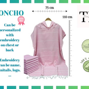 May include: Pink hooded poncho made of 100% cotton with white stripes. The poncho is 75 cm wide and 110 cm long. It can be personalized with embroidery on the chest or back. The embroidery can be a name, initials, logo, or other design.