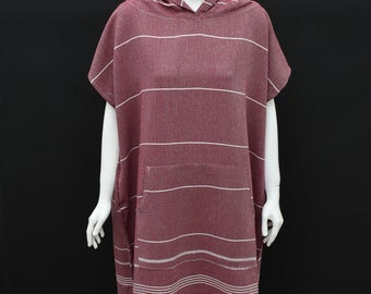 May include: A hooded burgundy and white striped beach towel with a pocket. The towel has a fringe trim.
