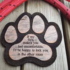 Wooden plaque hanging dog quote
