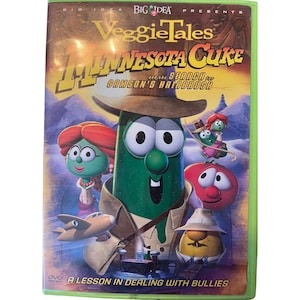 May include: A DVD cover for the VeggieTales movie "Minnesota Cuke and the Search for Samson's Hairbrush". The cover features a green, anthropomorphic cucumber wearing a brown hat and a red, anthropomorphic tomato wearing a white hat. The text on the cover reads "VeggieTales", "Minnesota Cuke", "and the Search for Samson's Hairbrush", and "A Lesson in Dealing with Bullies".